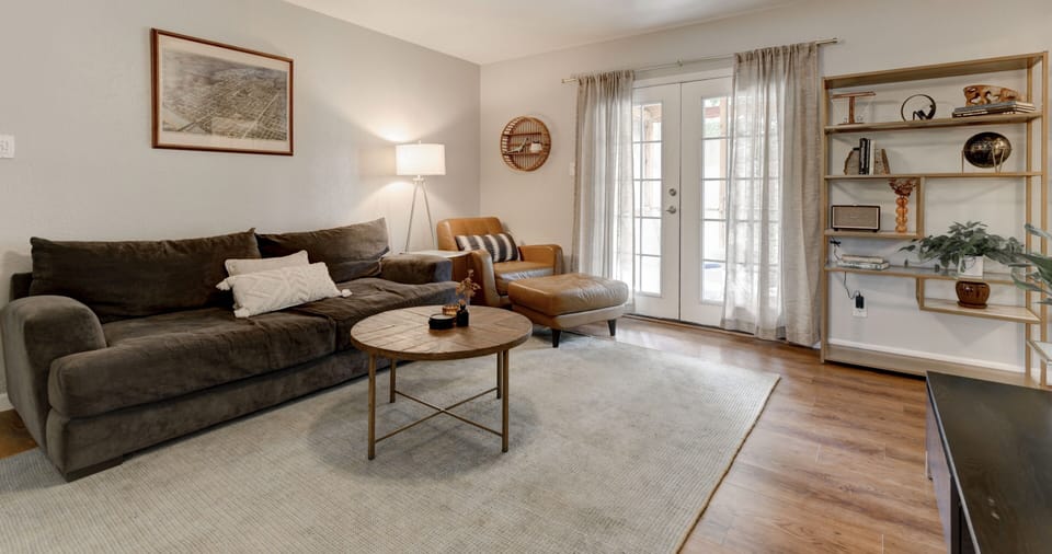 Open living area with smart TV, Google fiber WiFi, Bluetooth speaker, and games.