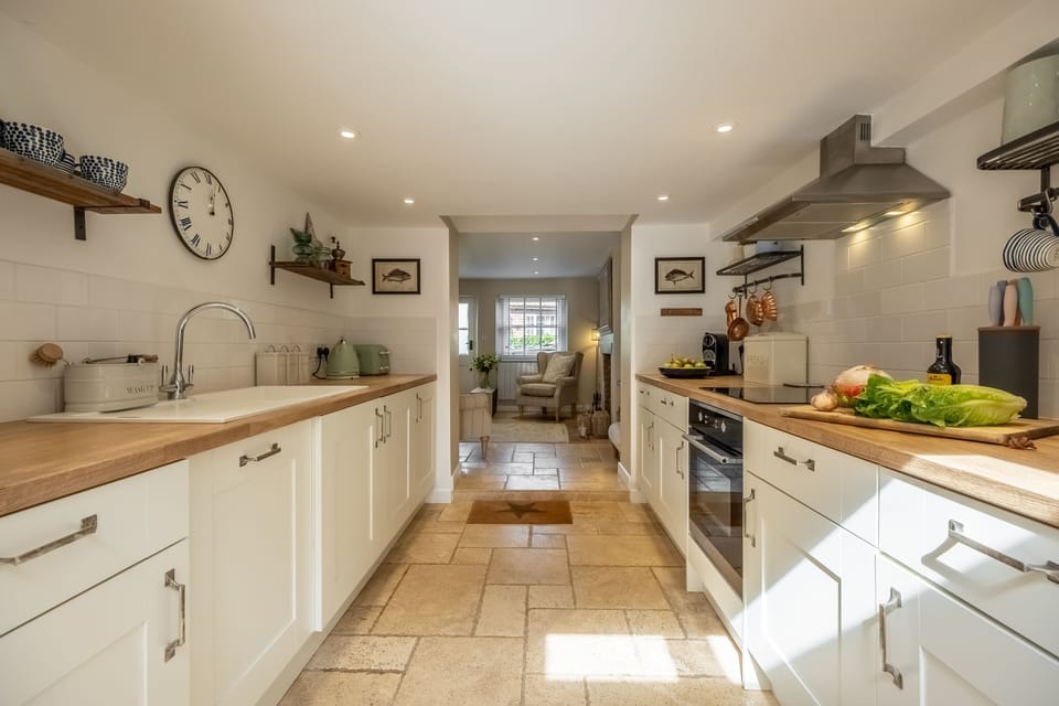 Ground floor: Galley kitchen with modern appliances