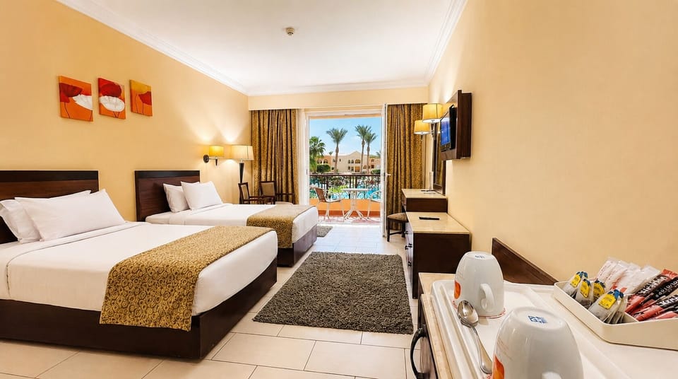 Deluxe Pool View | Hypo-allergenic bedding, down comforters, minibar, in-room safe