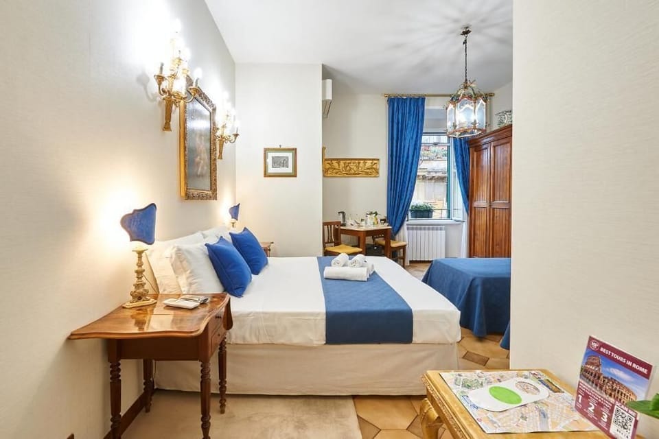 Classic Quadruple Room | Down comforters, free minibar, individually furnished, desk