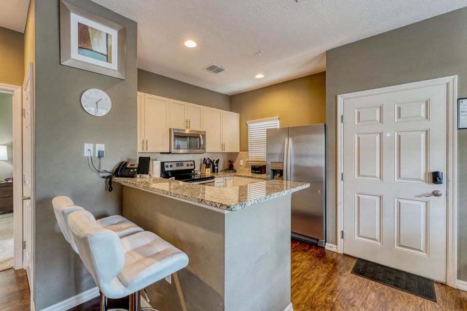 Kitchen with breakfast bar seating for 2