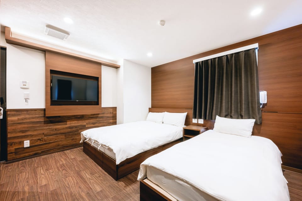 Standard Triple Room | Desk, laptop workspace, blackout drapes, soundproofing