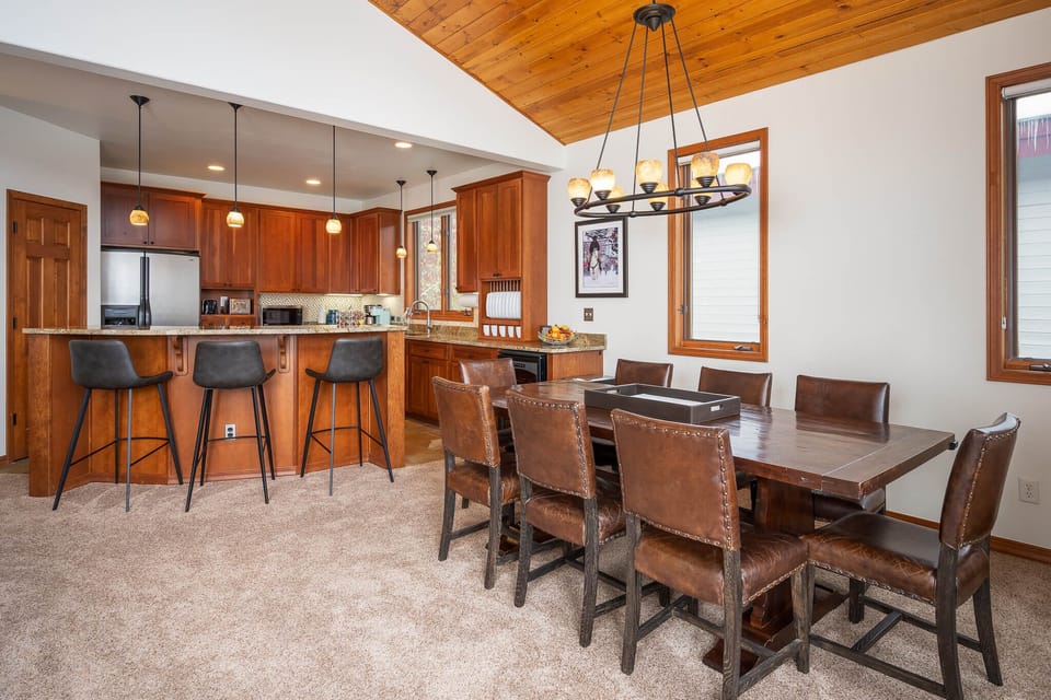 Seating for eight at the table and three at the breakfast bar