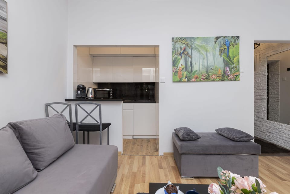 A view of the dining and kitchen area, creating a cohesive and functional layout.
