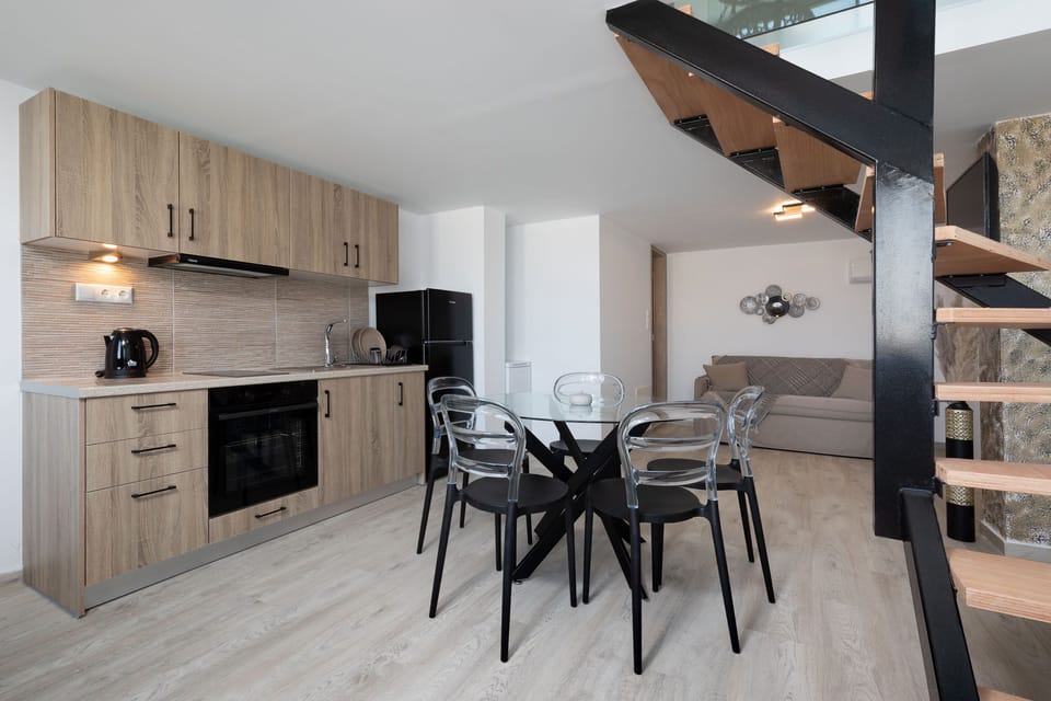 Deluxe Duplex, 2 Bathrooms, Sea View | Living area | Smart TV
