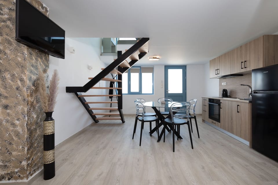Deluxe Duplex, 2 Bathrooms, Sea View | Living area | Smart TV