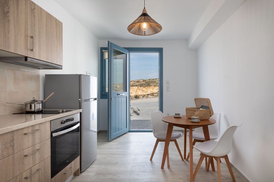 Comfort Studio | Private kitchen | Full-size fridge, stovetop, electric kettle, toaster