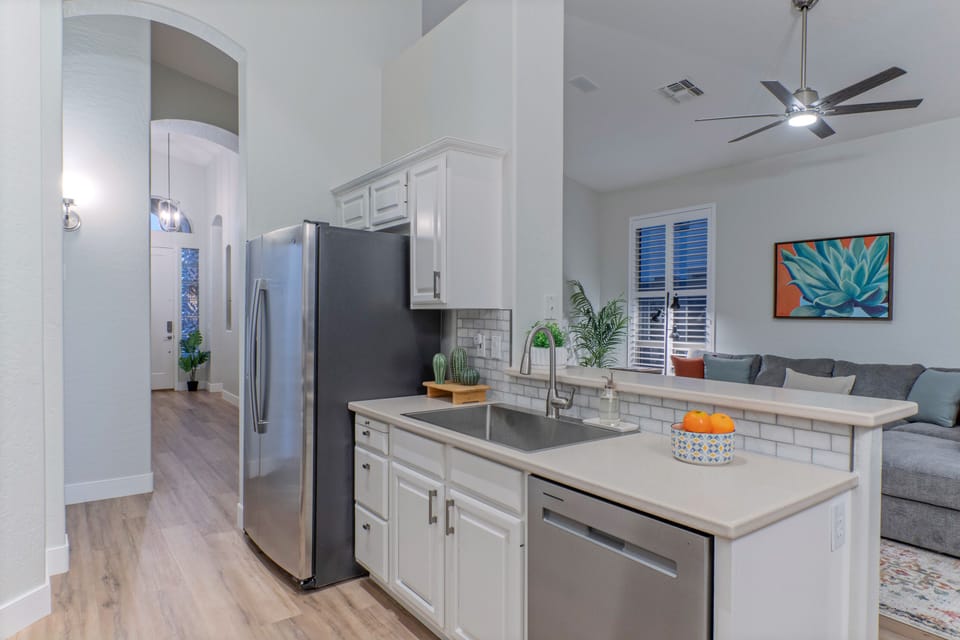 Kitchen opens into great room for easy transfer of food and drinks.