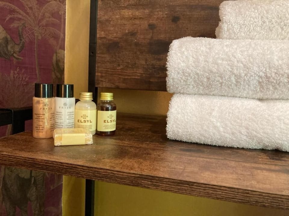 Deluxe Triple Room | Bathroom | Slippers