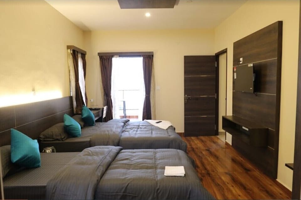 Family Triple Room | Egyptian cotton sheets, premium bedding, down comforters