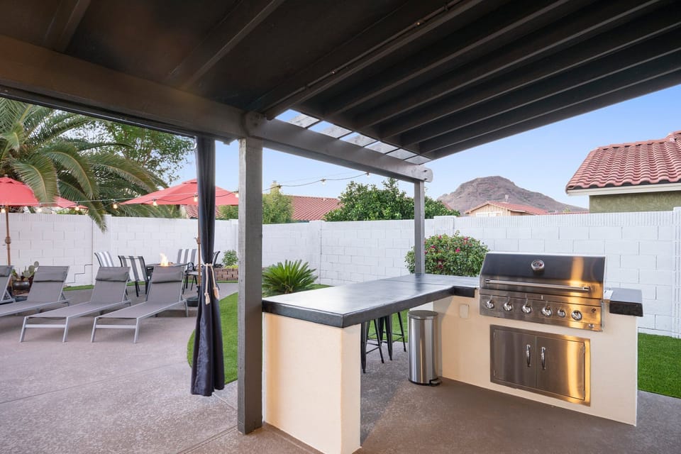 Outdoor grill and bar seating