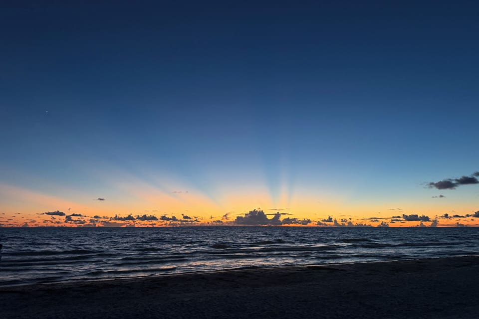 The Pink Cottage is just across the street from beach access where you will see the most gorgeous sunsets in the world!