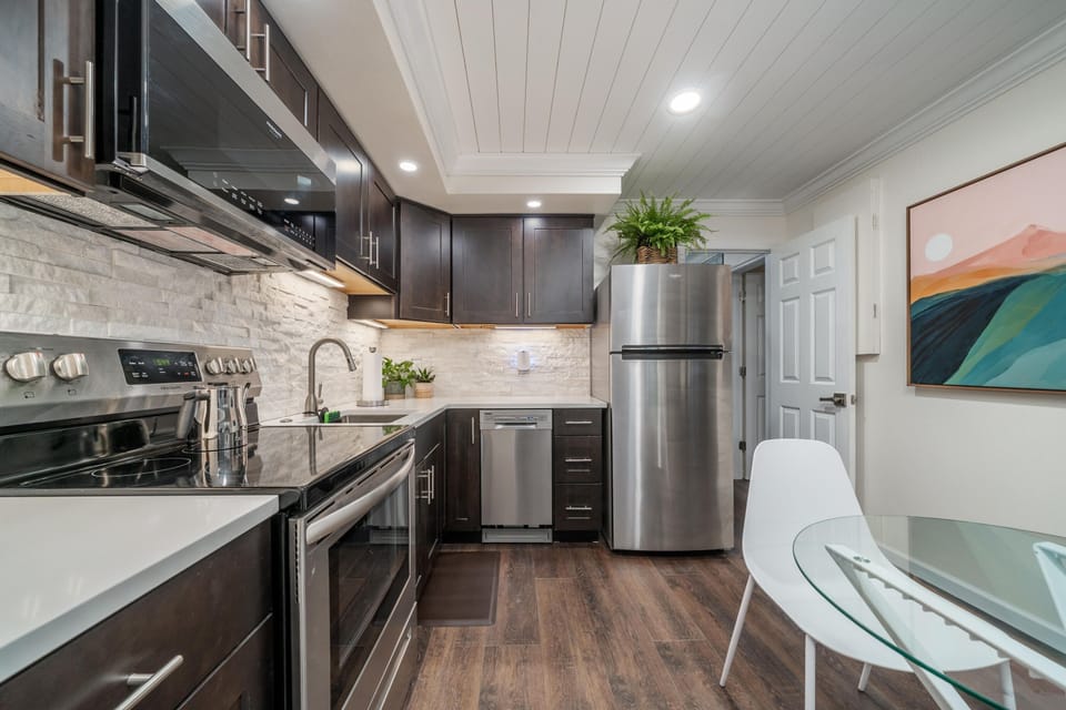 Kitchen is stocked with Pots, pans, dishes, appliances, silverware, cutlery!
