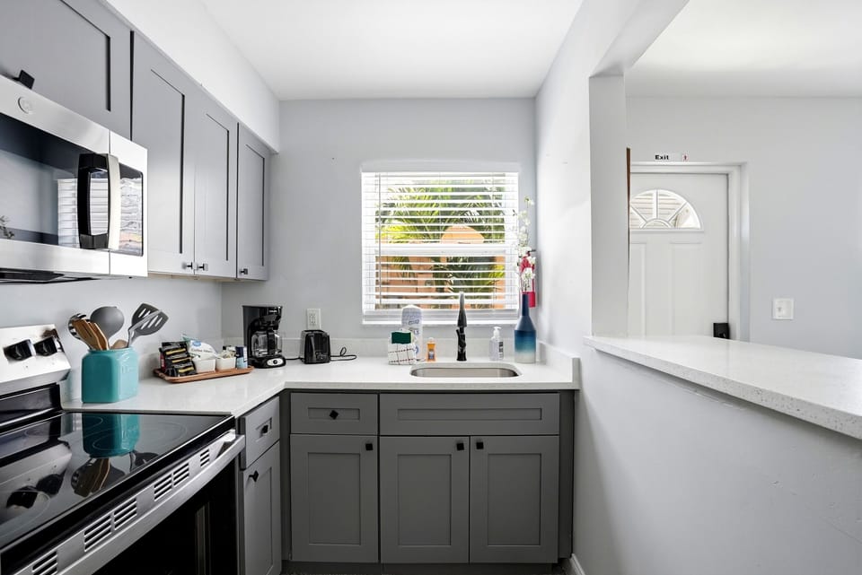 The cozy kitchen is stocked with all the supplies you will need for a home cooked meal.  We also have a drip coffee maker (and coffee), microwave, blender, crock pot, cookie sheets, and some basic spices for you to use. 