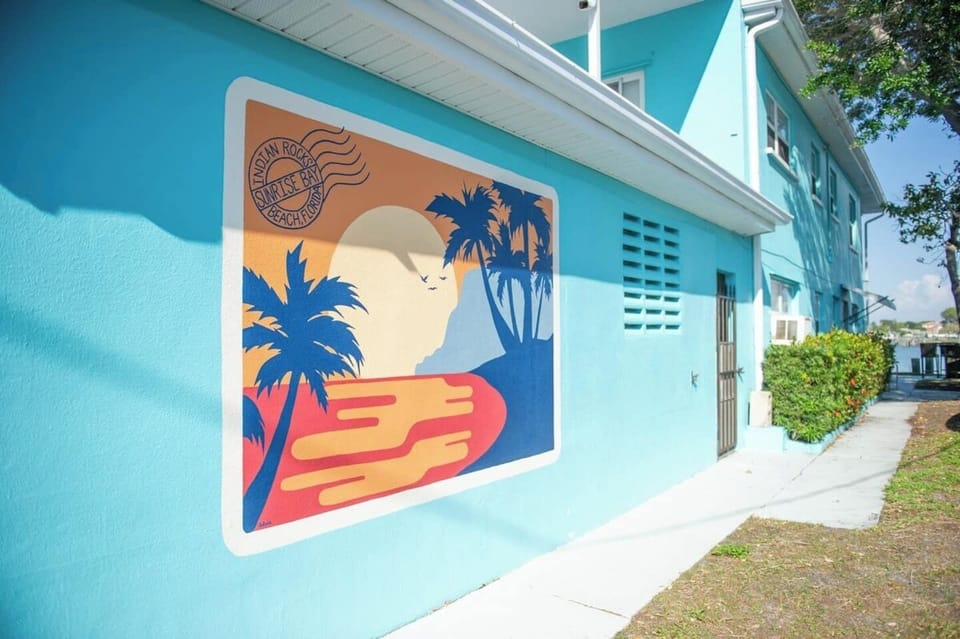 Make sure to grab a picture in front of our beautiful custom mural and tag #SunriseBay and share on social media!  Our artist, Amy, is so talented!