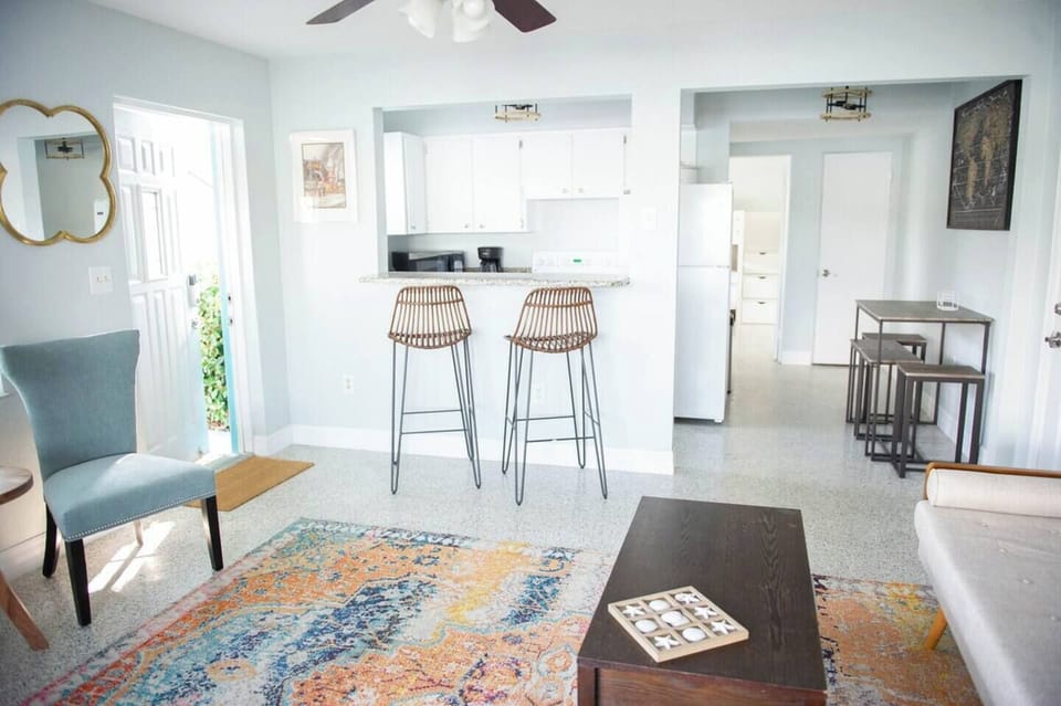 Unit 1-Drink your morning coffee or grab a snack at the bar.  Even better- drink your morning coffee on the back porch while you watch the dolphins swim!