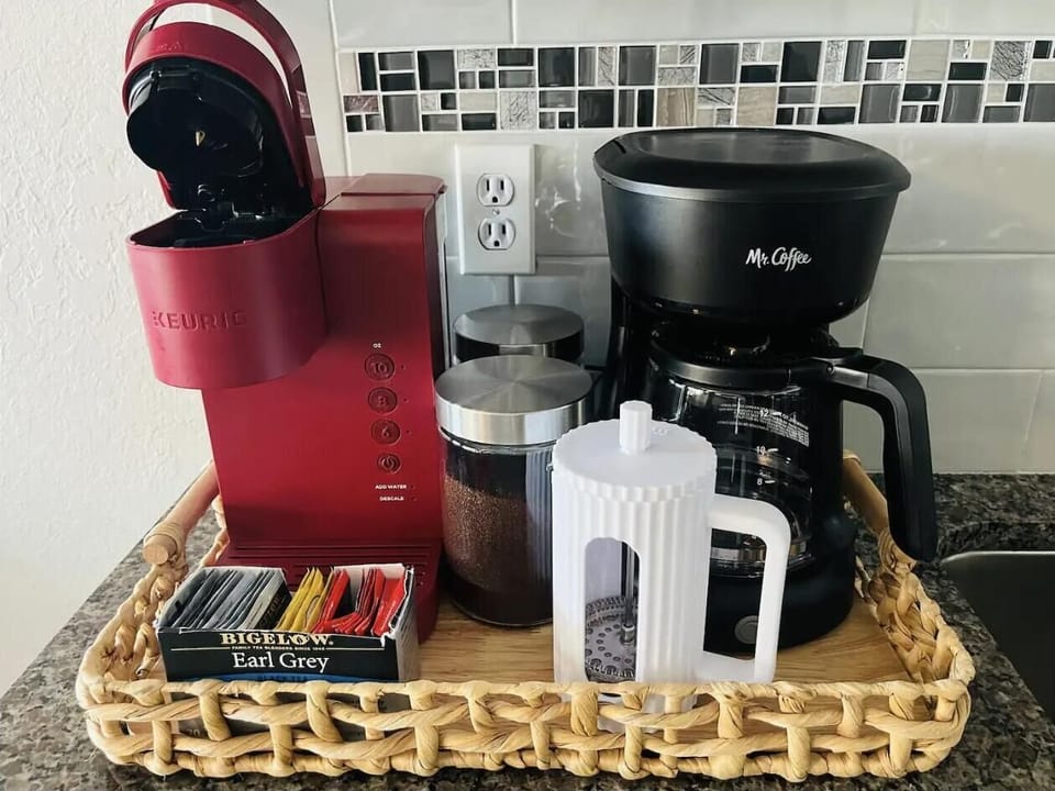 Kitchen with Keurig, drip coffee maker, French press, and tea