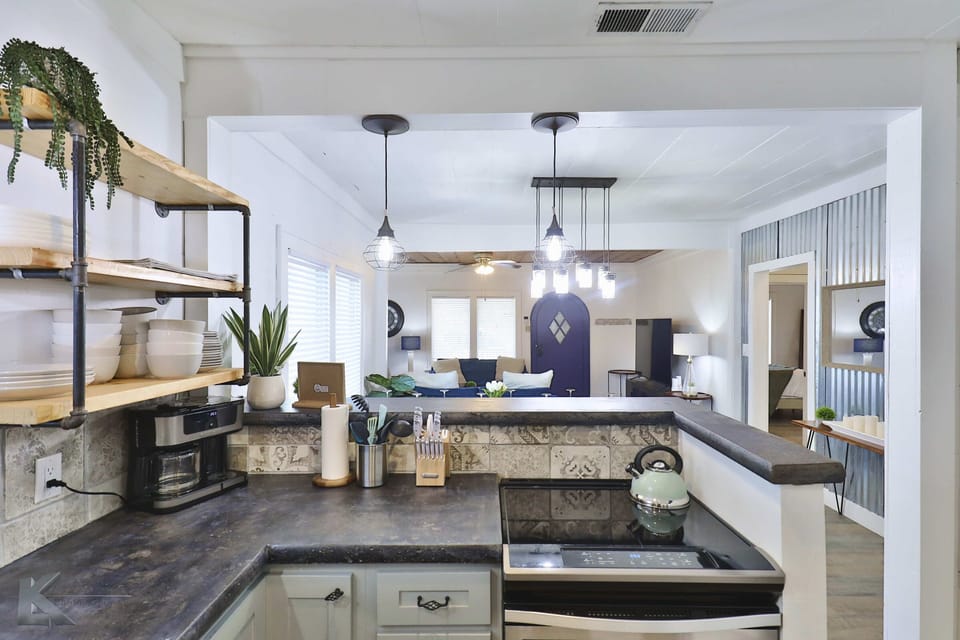 Fully stocked kitchen with free coffee, cooking kitchen amenities.