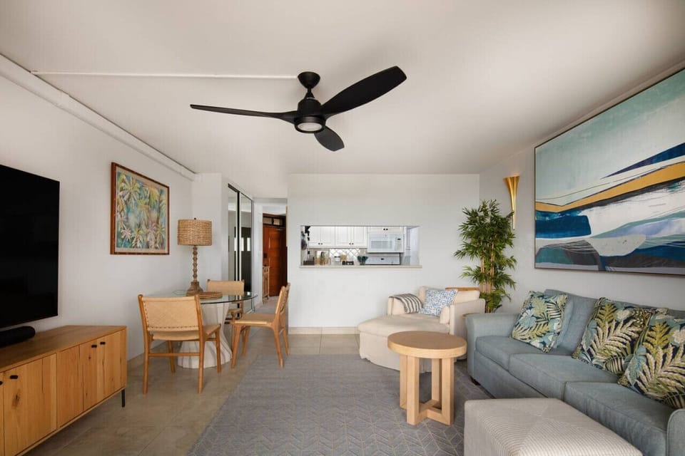 Living room, dining area and the kitchen. The sofa is a queen size sleeper. Comfy armchair with an ottoman facing the views. 75" 4K smart Sony TV. Sonos soundbar.