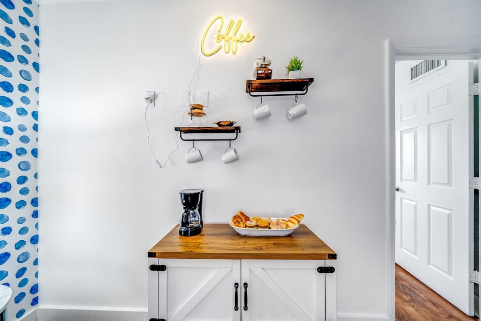 Nothing's cozier than a hot cup of coffee, right? At Palm Wave Stays, every unit comes with a coffee station for ultimate relaxation. Curl up with a book or your fave series & let your caffeine kick in. Book now! www.palmwavestays.com