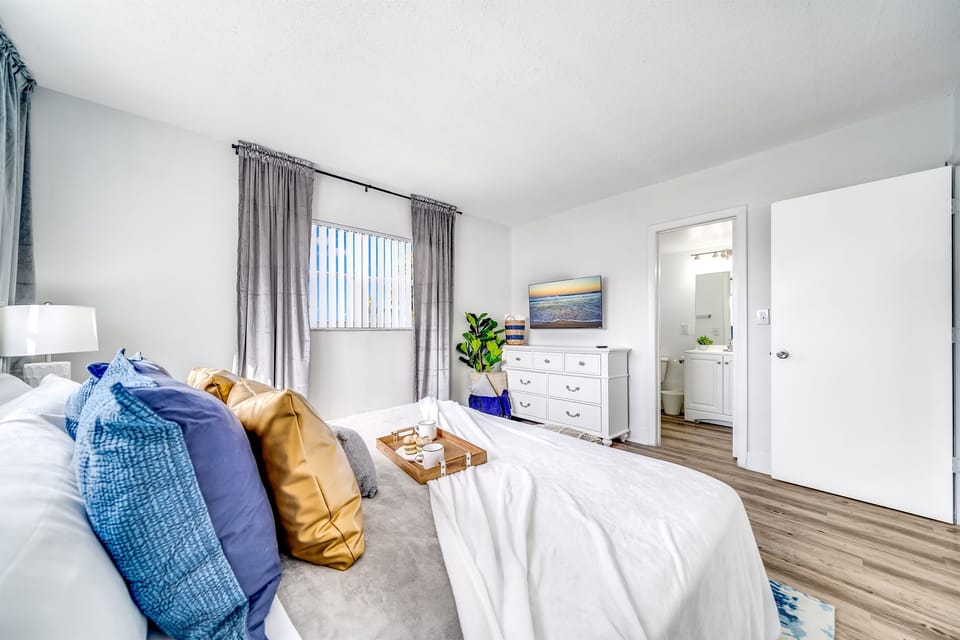 Bedroom with bathroom and closet