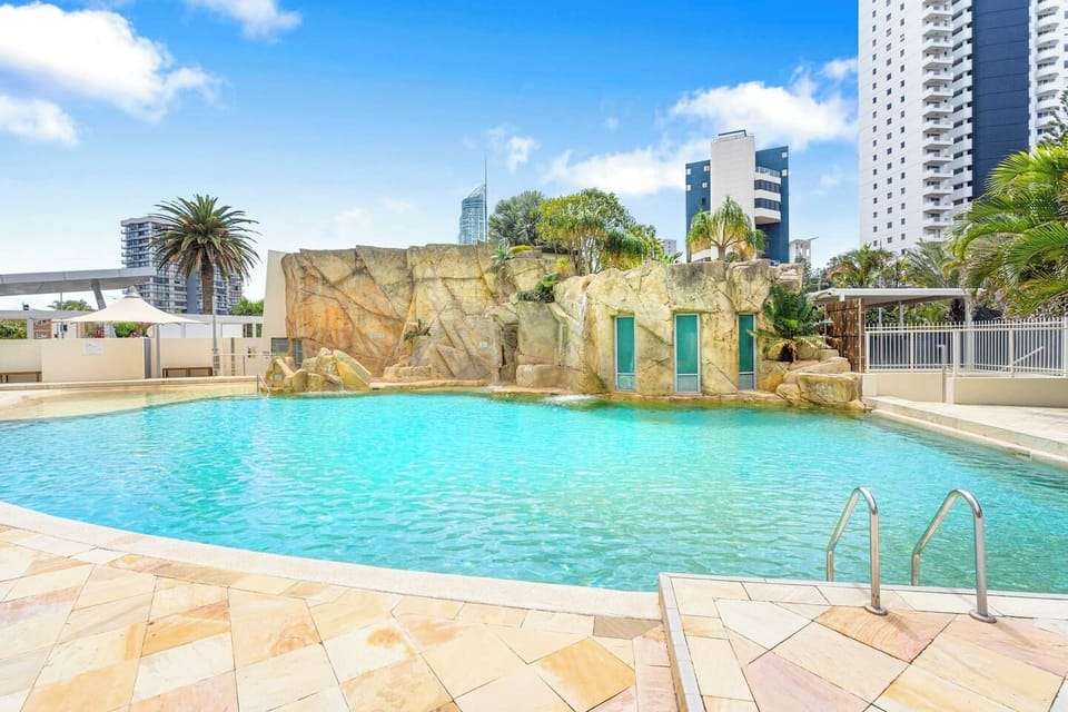 Resort-style outdoor pool with a spa for ultimate relaxation