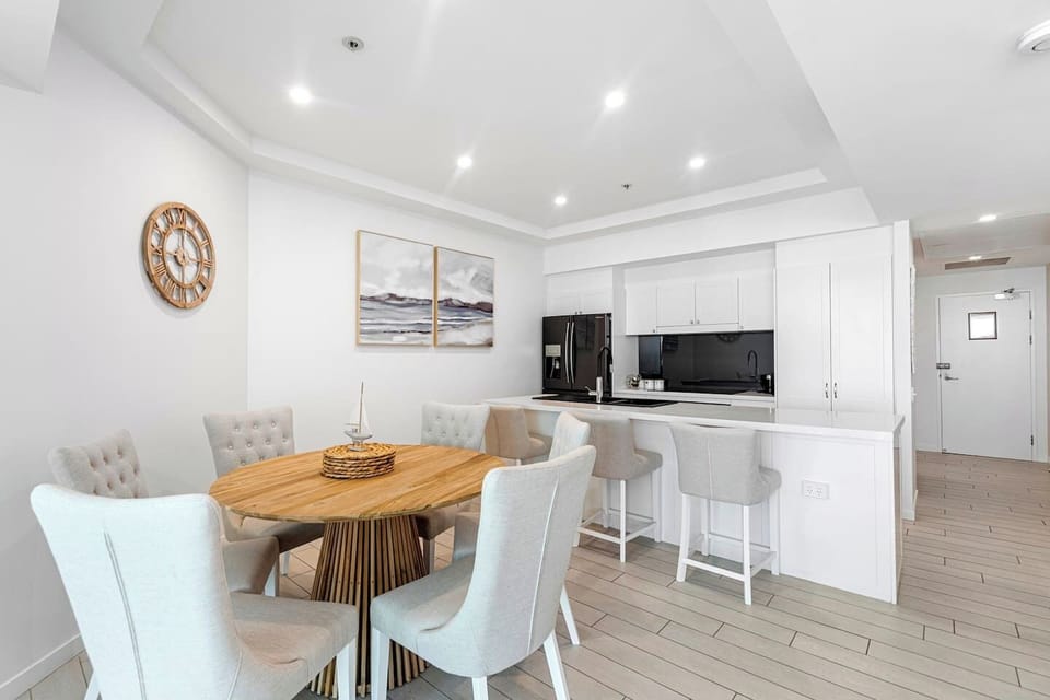 The dining area seats six, with an additional three seats at the kitchen island, and the fully equipped kitchen boasts modern appliances for all your culinary needs.