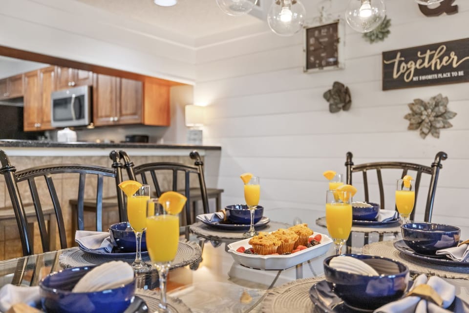 Dining Area seats 6 at the table and extra seating at the bar.