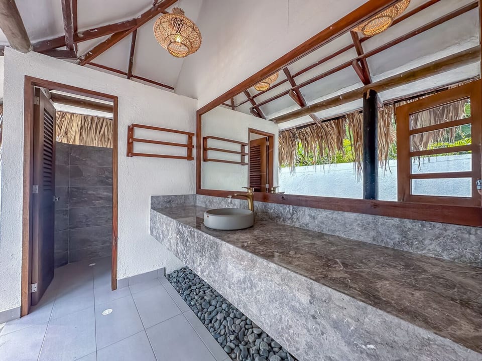 Basic Shared Dormitory | Bathroom | Shower, free toiletries, towels, soap