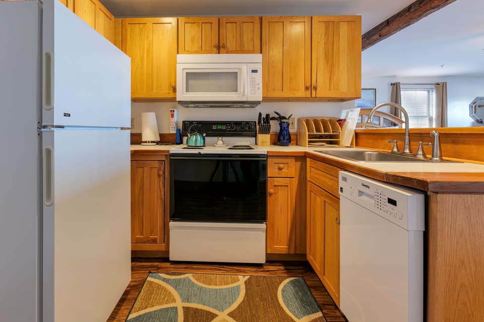 kitchen - dishwasher, microwave, fridge, stove, coffee maker