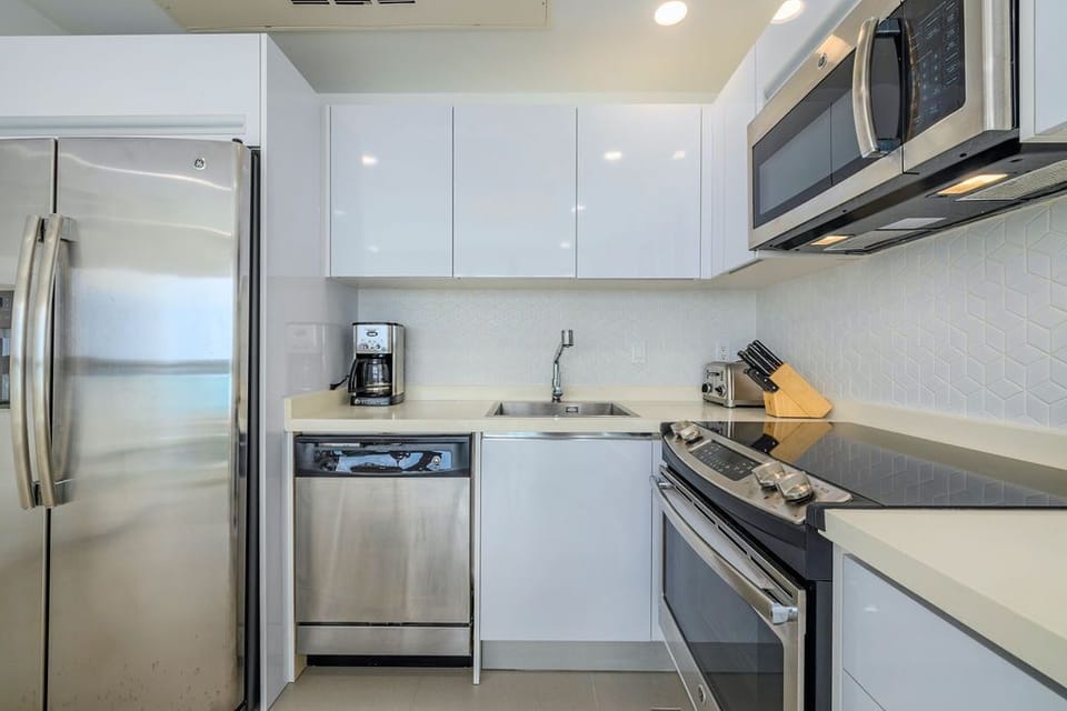Your sleek, modern kitchen awaits with stainless steel appliances, a gas range, and all the tools you need to prepare your favorite meals in style.
