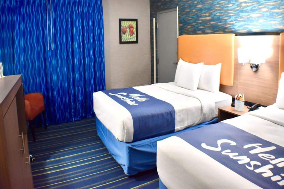 Room, 2 Queen Beds, Non Smoking | In-room safe, desk, blackout drapes, iron/ironing board