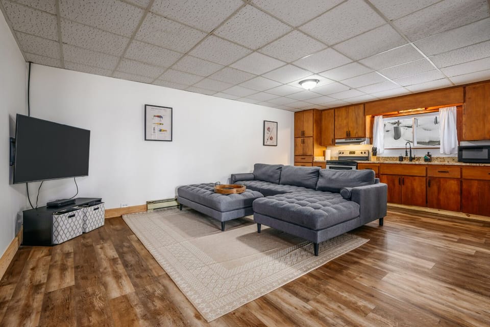 A stylish living room with cozy seating—ideal for movie nights and memorable get-togethers!