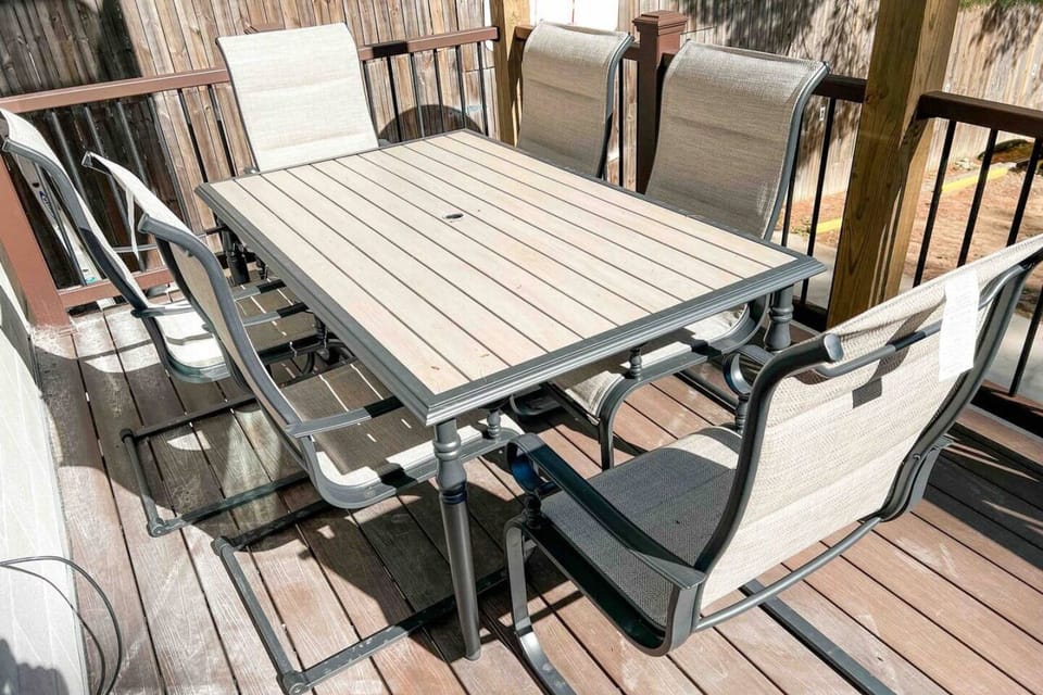 Enjoy sunlit meals and laughter on your balcony patio table.