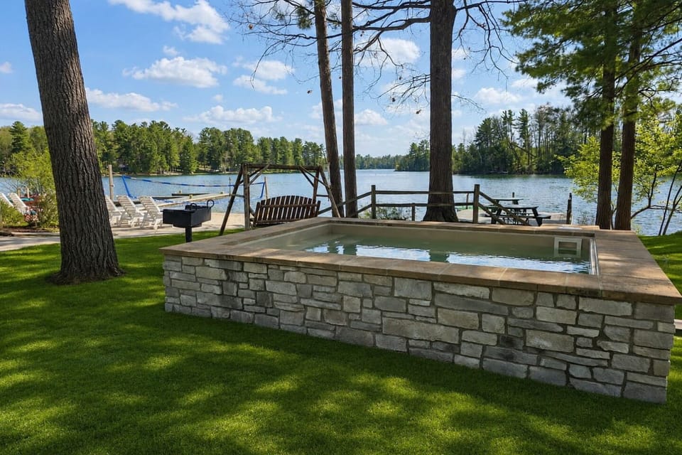 Shared Resort's Hot Tub: Fair warning: once you're in the hot tub with lake views, getting out becomes very, very difficult. 😏 Don't say we didn't warn you.