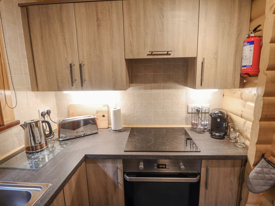 Fridge, electric kettle, toaster, cookware/dishes/utensils