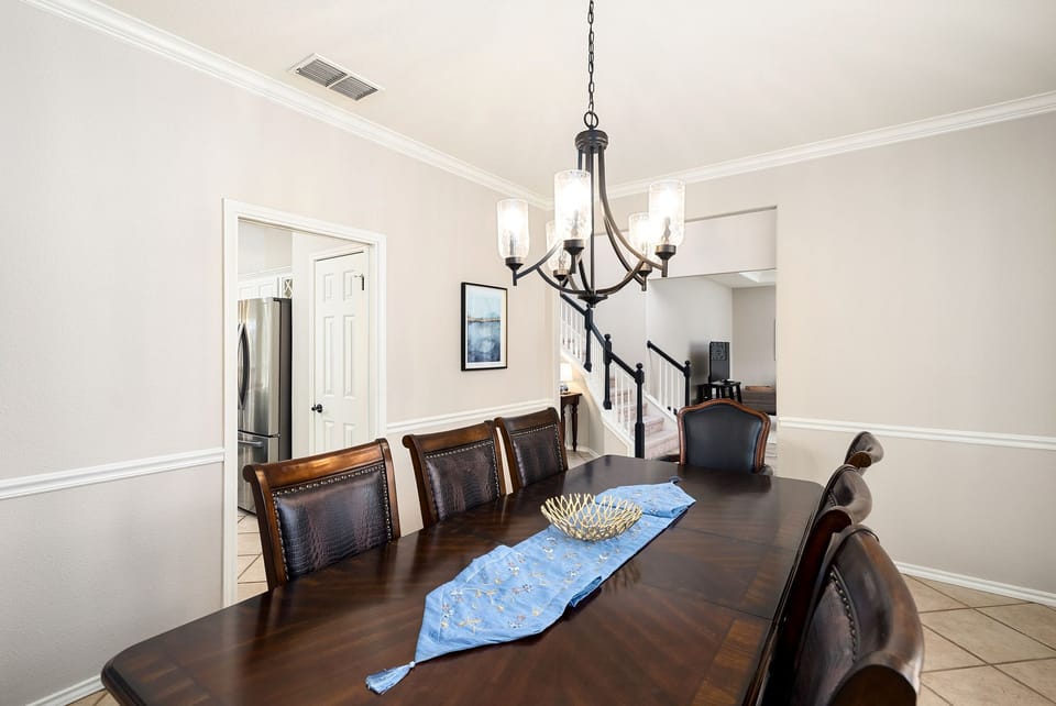 Dining room - table pad and cloth is provided.
