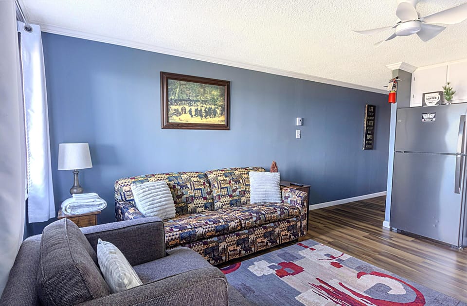 The comfortable living room is the perfect place to relax after an adventurous day on the mountain.