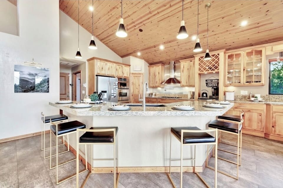Spacious Gourmet Kitchen with Oversized Island & Seating for Six