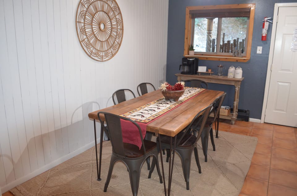 Dining table seats 6. Coffee bar includes a Keurig Duo coffee maker.