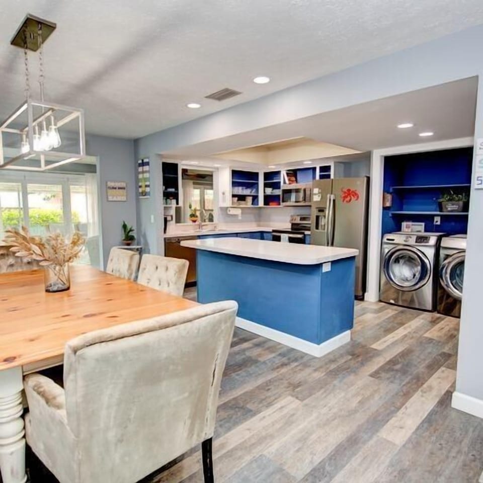 Open concept and spacious kitchen with plenty of appliances to cook that Thanksgiving or Christmas dinner.