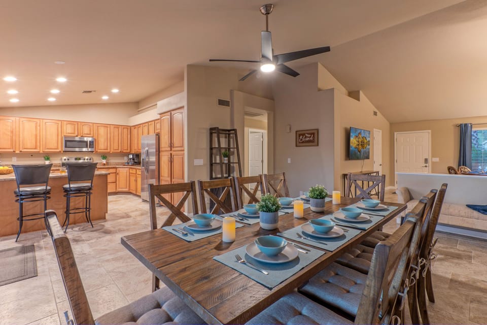 Open floor plan includes a classy dining room with seating for 10.