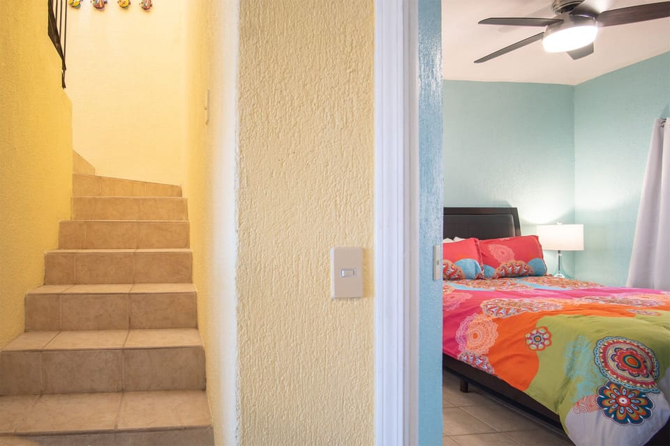stairs leading to the upstairs bedroom
