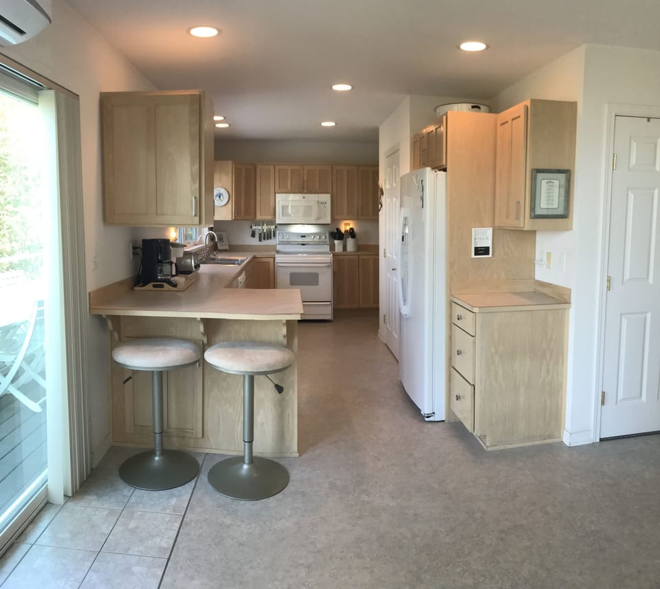 Kitchen breezeway, one of 3 ways in getting to the lower level.  