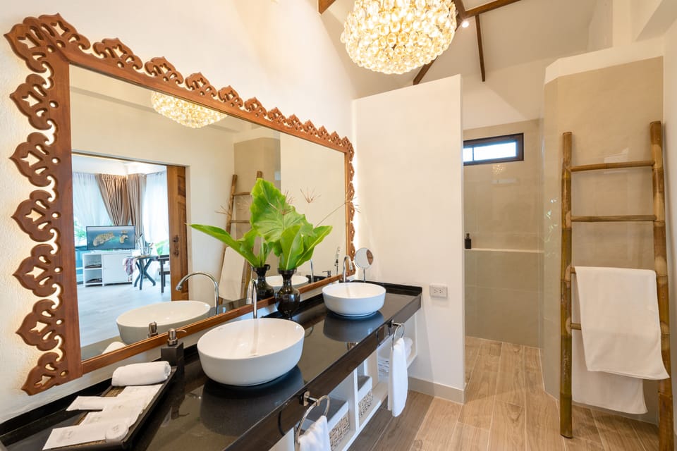Luxury Room, 1 King Bed, Terrace, Partial Sea View | Bathroom | Shower, rainfall showerhead, free toiletries, hair dryer