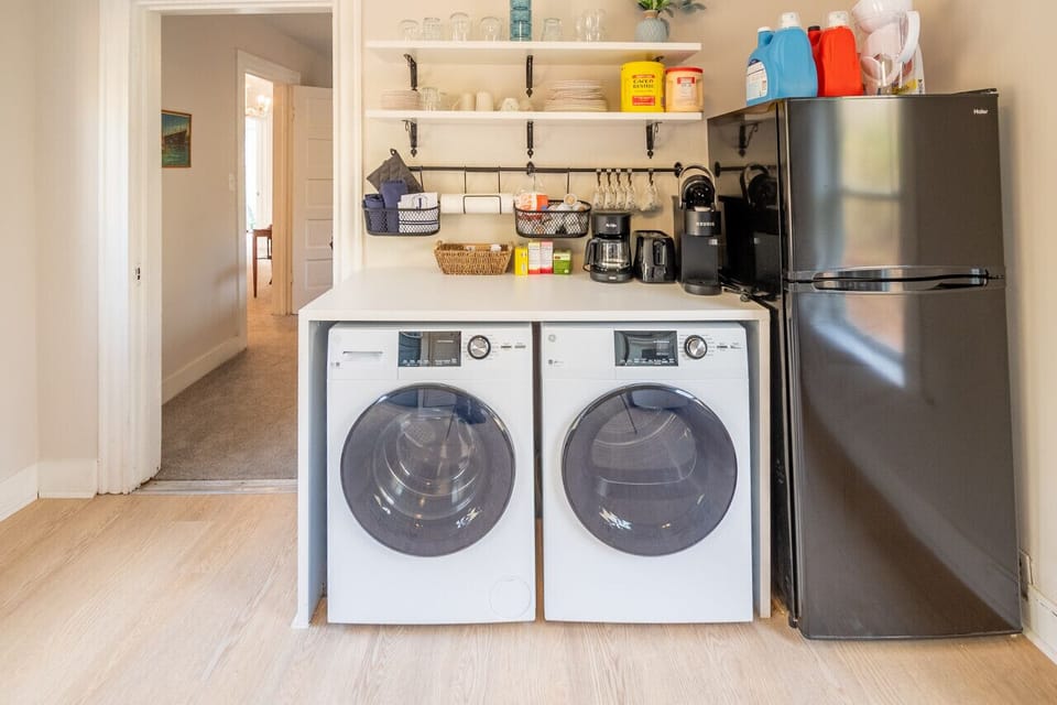 Full kitchen with new washer and dryer.