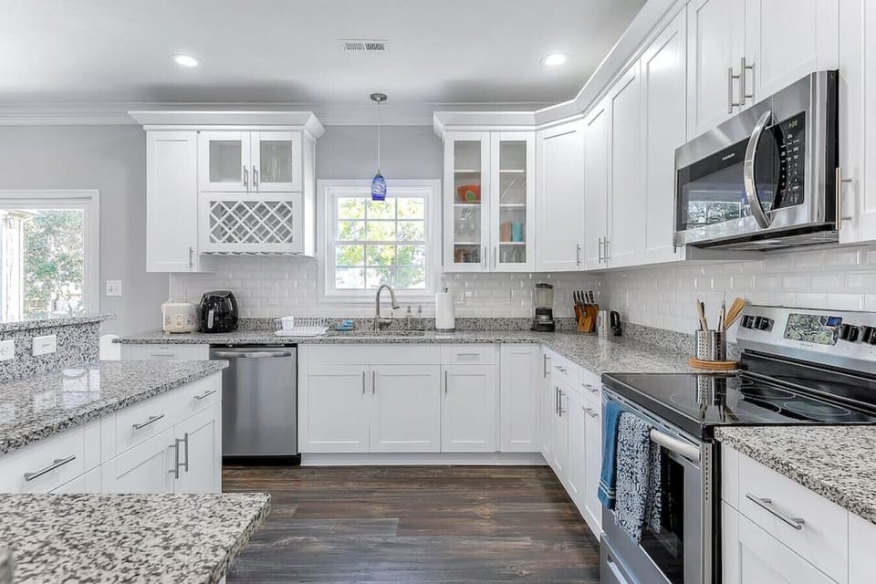 Fully stocked open style kitchen!