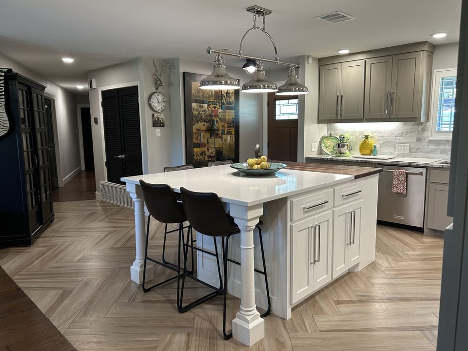 Kitchen was recently remodeled with a large center island for entertaining. 