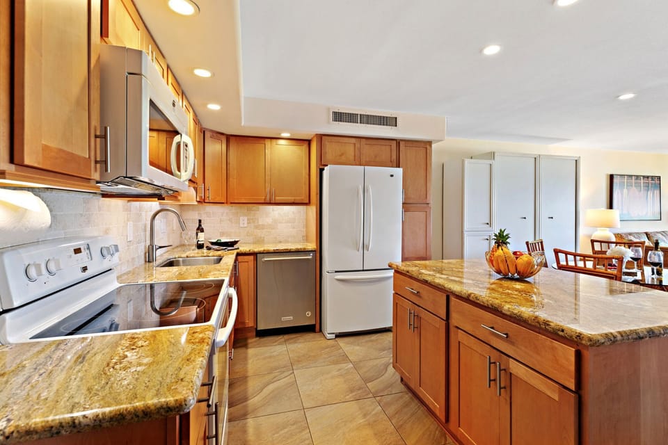 Open Kitchen Design - Granite sold surfaces with latest full kitchen amenities!