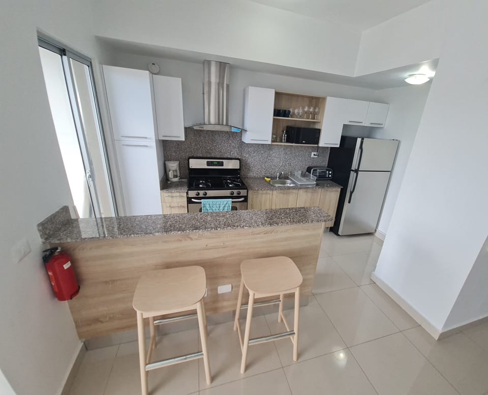 Comfort Apartment | Private kitchen | Full-size fridge, microwave, oven, stovetop
